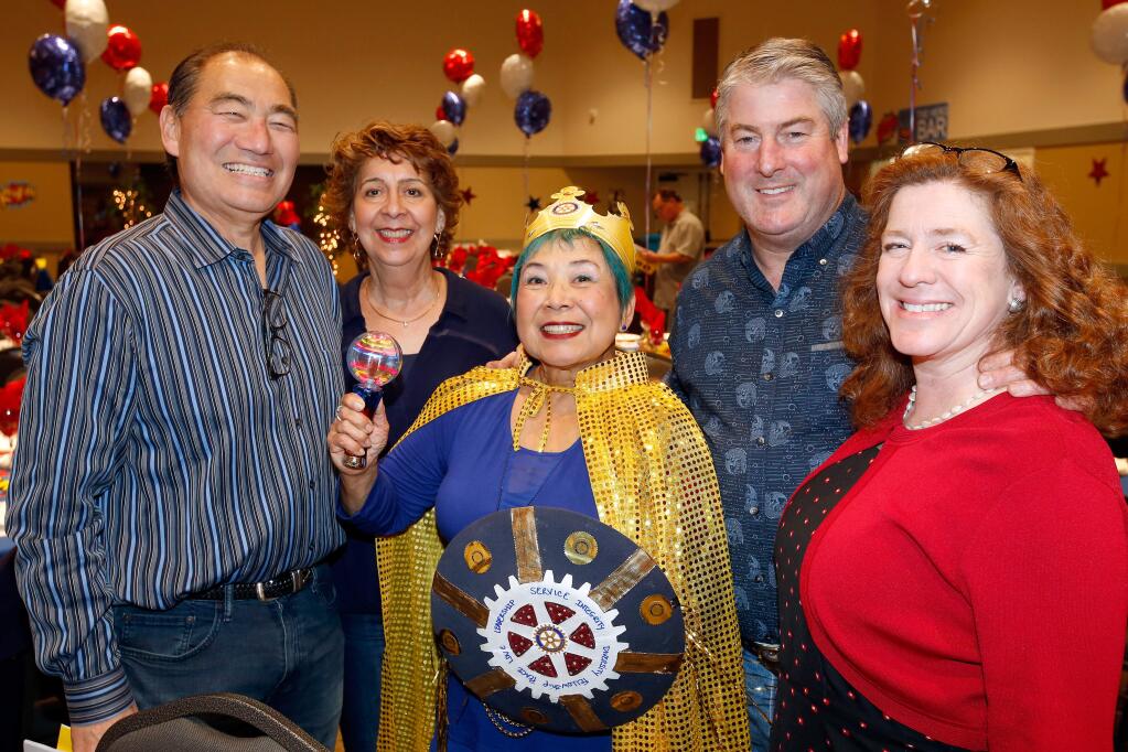 Larry Miyano, left, Mary Miyano, Chris Parr-Feldman, Paul Doyle, and Valerie Doyle attend 'A Night of Heroes' themed crab feed presented by the Rotary Club of Santa Rosa West at Friedman Event Center in Santa Rosa, California, on Saturday, February 17, 2018. (Alvin Jornada / The Press Democrat)