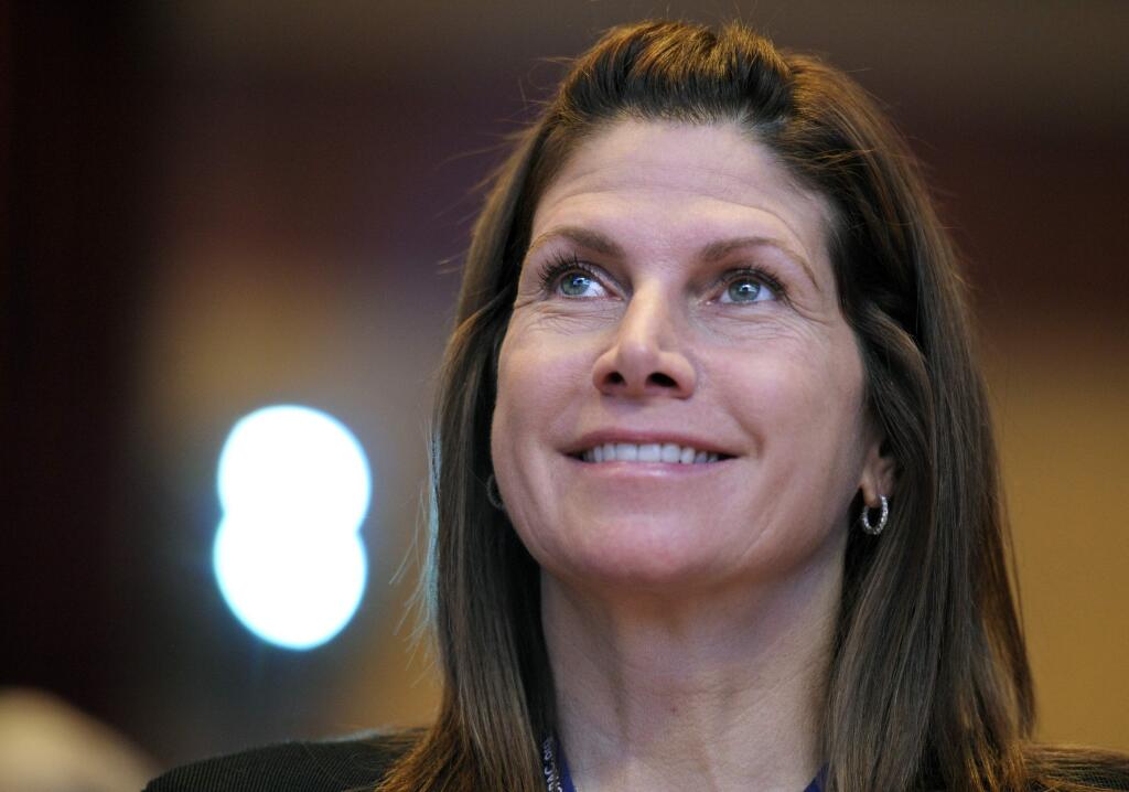 FILE - In this Feb. 12, 2011, file photo, then-Rep. Mary Bono, R-Calif., listens at the Conservative Political Action Conference (CPAC) in Washington. Former California Congresswoman Bono announced her resignation Tuesday, Oct. 16, 2018, as the interim president at USA Gymnastics after just four days on the job. (AP Photo/Cliff Owen, File)