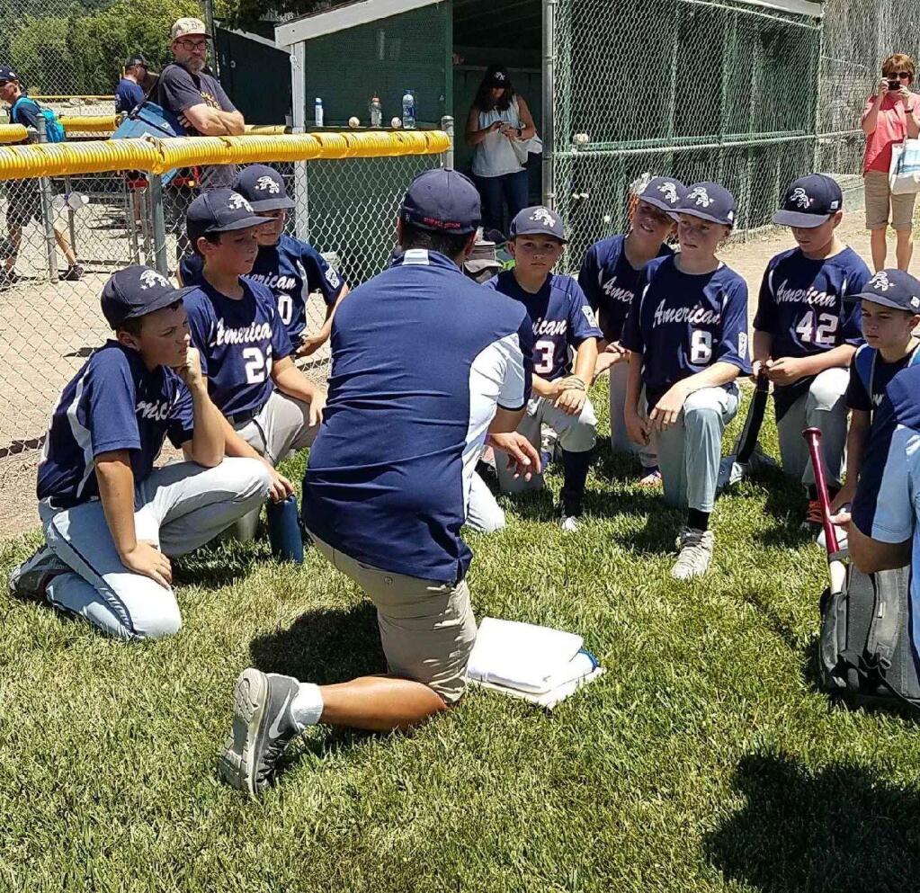 JOHN JACKSON/ARGUS-COURIER STAFFThe Petaluma American 9-11-year-old All-Star players discuss what comes next after winning the District 35 Tournament.