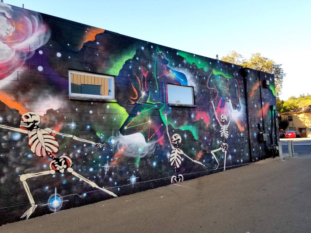 Led by renowned spray paint artist Chor Boogie, teens painted a large mural outside of Sonoma Valleys Republic of Thrift store. The Sonoma Valley Museum of Art put the project together in collaboration with La Luz Center and the Art Escape arts training center. The project was unveiled Oct. 14, 2018. (DIANNE AOKI)