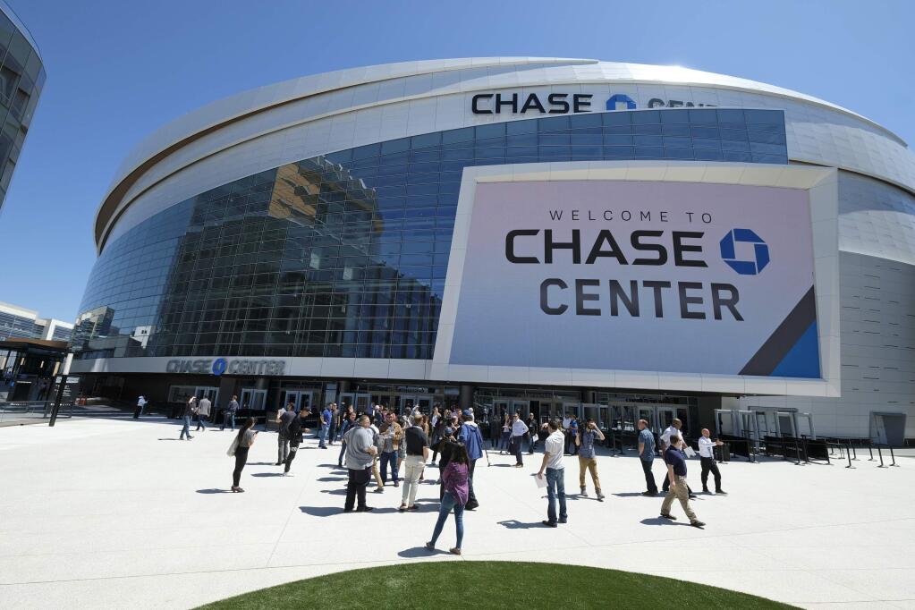 In this photo taken Monday, Aug. 26, 2019, is an exterior view of the Chase Center in San Francisco. The Chase Center is the new home of the Golden State Warriors NBA basketball team. (AP Photo/Eric Risberg)