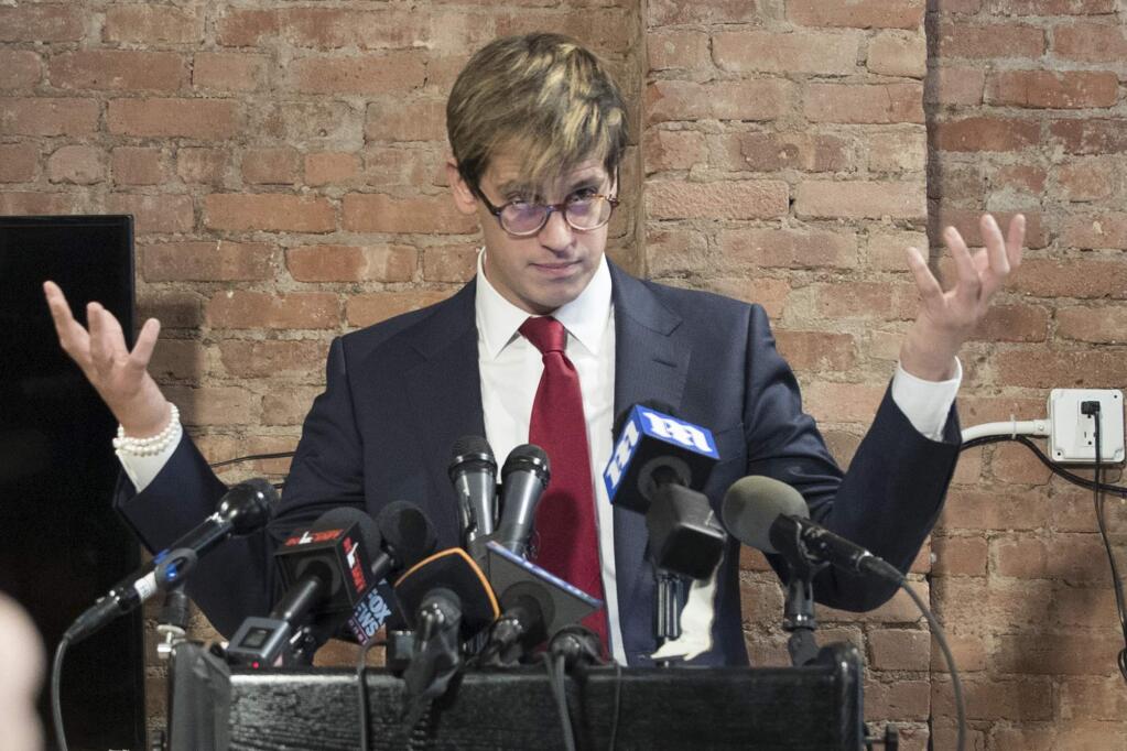 Milo Yiannopoulos speaks during a news conference Feb. 21 in New York. (MARY ALTAFFER / Associated Press)