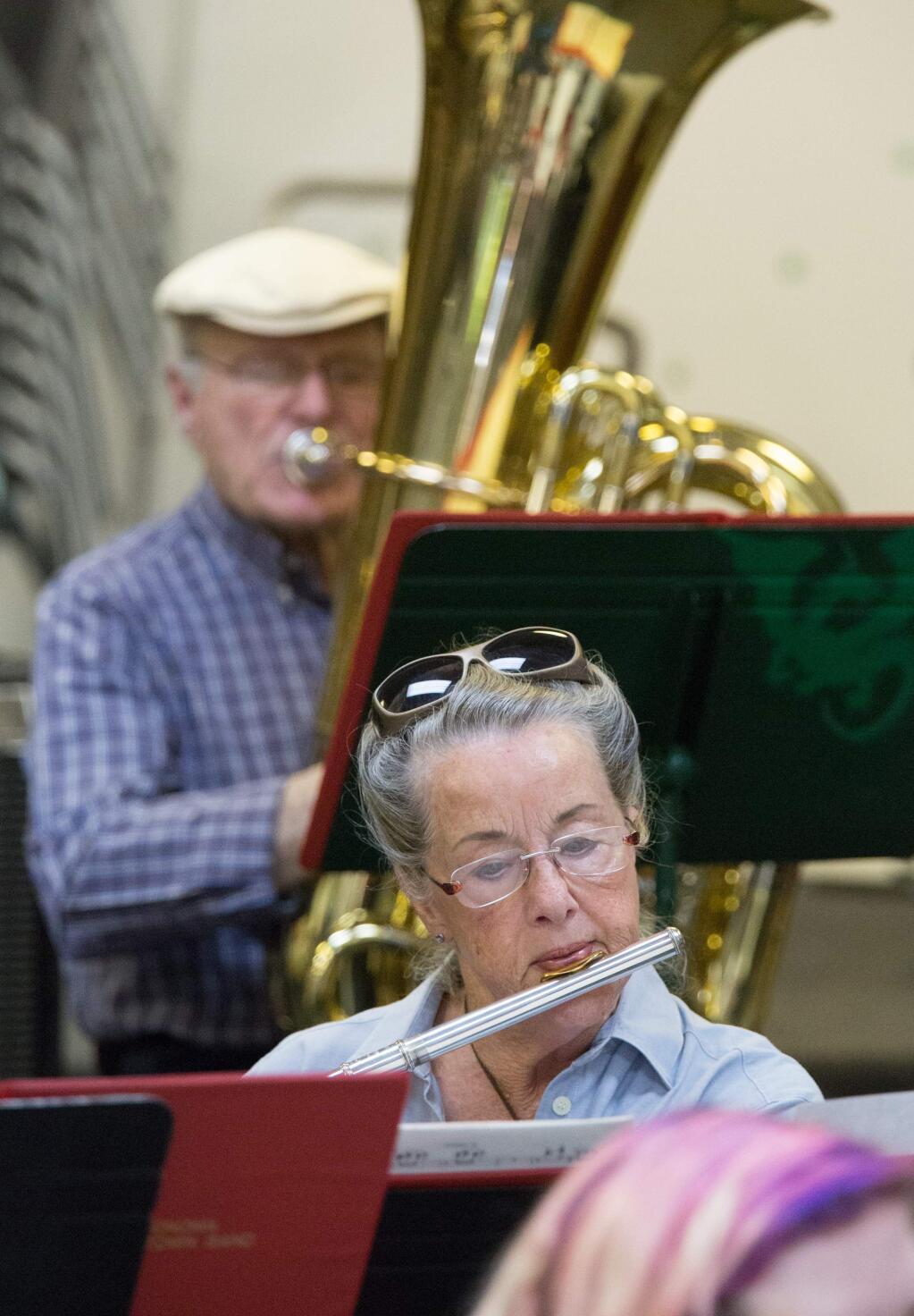 Kim Brown played the flute with fellow members of the Sonoma Hometown Band during their weekly rehearsal at Sonoma High School last year. (Jeremy Portje/Press Democrat)