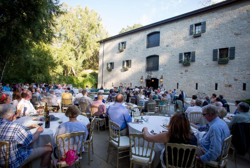 Guests listen to Robin Hansen and Elizabeth Prior perform with fellow musicians during a Midsummer Mozart concert at Buena Vista Winery in Sonoma, Calif Saturday, July 22, 2017. 'The Midsummer Mozart Festival was founded in 1974 by George Cleve and a regional consortium of classical musicians, who recognized him as one of the world's great interpreters of the music of Wolfgang Amadeus Mozart,' according to their website. (Jeremy Portje / For The Press Democrat)