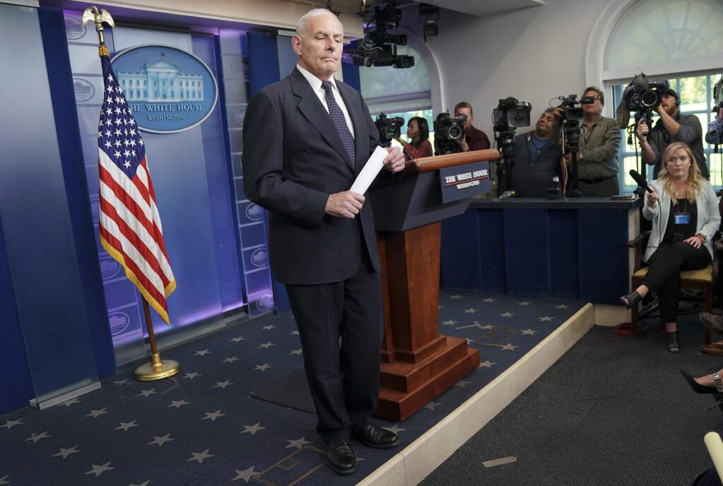 White House Chief of Staff John Kelly stands next to the podium while speaking to the media during the daily briefing in the Brady Press Briefing Room of the White House in Washington, Thursday, Oct. 19, 2017. (AP Photo/Pablo Martinez Monsivais)