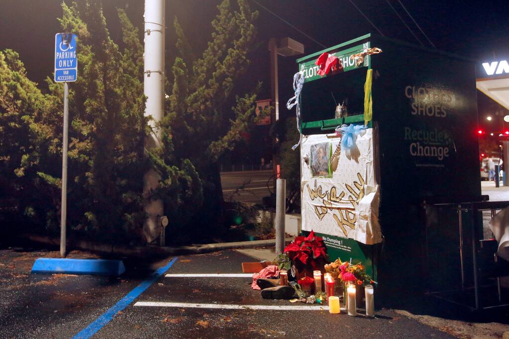 A items forming a makeshift memorial for Kaily Land are seen at clothing donation box where Land died, off Old Redwood Highway North in Petaluma, California, on Thursday, November 29, 2018. (Alvin Jornada / The Press Democrat)