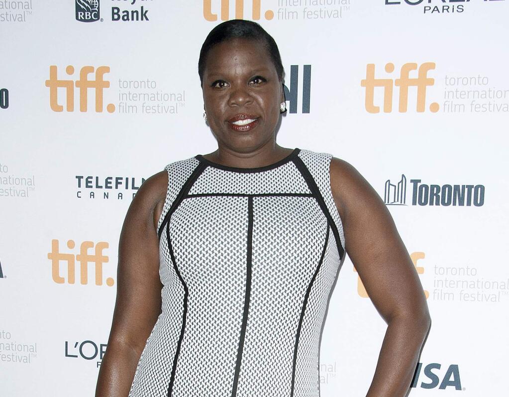 FILE - In this Sept. 6, 2014 file photo, actress Leslie Jones poses at the 'Top Five' premiere at the Princess of Wales Theatre during the 2014 Toronto International Film Festival in Toronto. NBC says 'Saturday Night Live' is adding Leslie Jones to its cast. The African-American comedian wins her on-camera role after serving as a writer on the show last season. (Photo by Arthur Mola/Invision/AP, File)