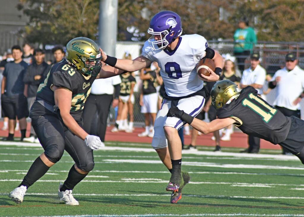 Petaluma High quarterback Henry Ellis, shown in the 2022 Egg Bowl against Casa Grande, will continue playing foortball at Bowdoin College in Maine. (Sumner Fowler / For the Argus-Courier)
