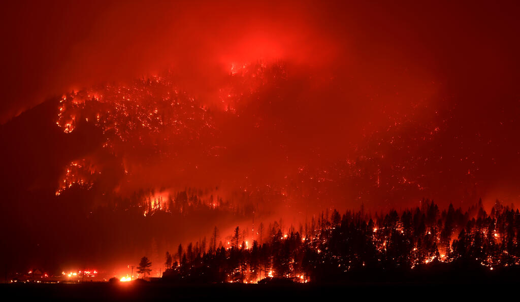 The Dixie Fire pummels Keddie Ridge that borders the Plumas and Lassen National Forests, as the fire, now more than 510 thousand acres, makes a strong push into Indian Valley east of Greenville, Monday, Aug. 9, 2021. Keddie peak is 5,663 feet in elevation. (Kent Porter / The Press Democrat) 2021