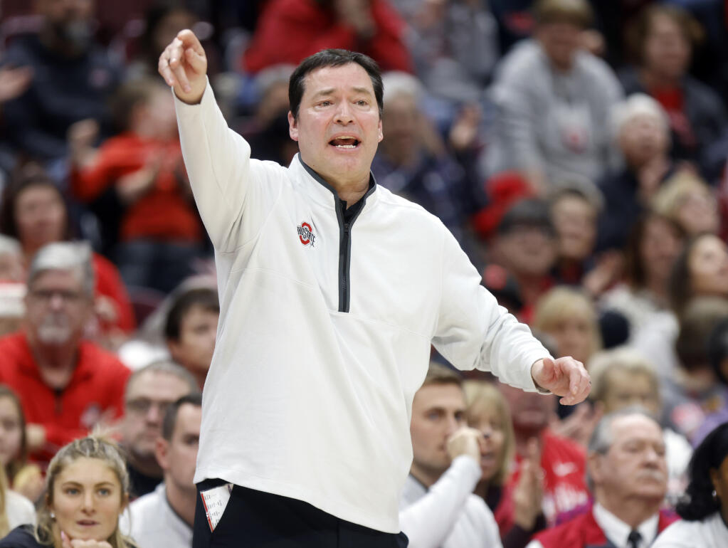 Ohio State coach Kevin McGuff directs his team during the second half of an NCAA college basketball game against Purdue in Columbus, Ohio, Sunday, Jan. 29, 2023. Purdue won 73-65. (AP Photo/Paul Vernon)