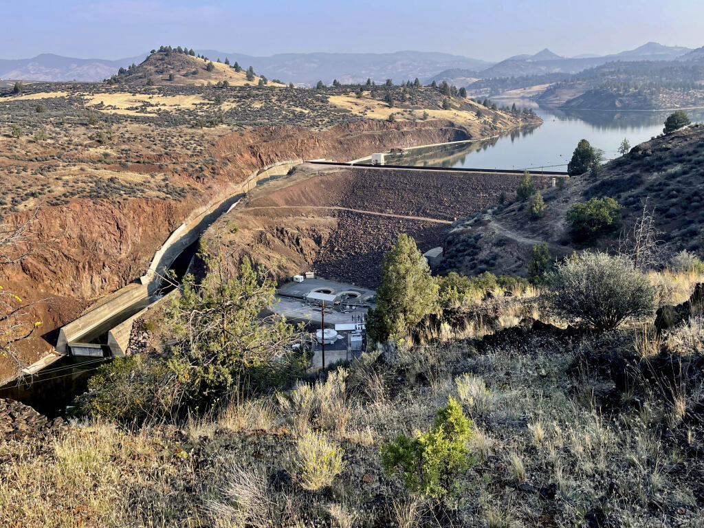 The Iron Gate Dam is seen in Hornbrook, Calif., Sept. 17, 2023. The dam is one of a series of four dams along the Klamath River which are part of the largest dam removal project in United States history. (AP Photo/Haven Daley)