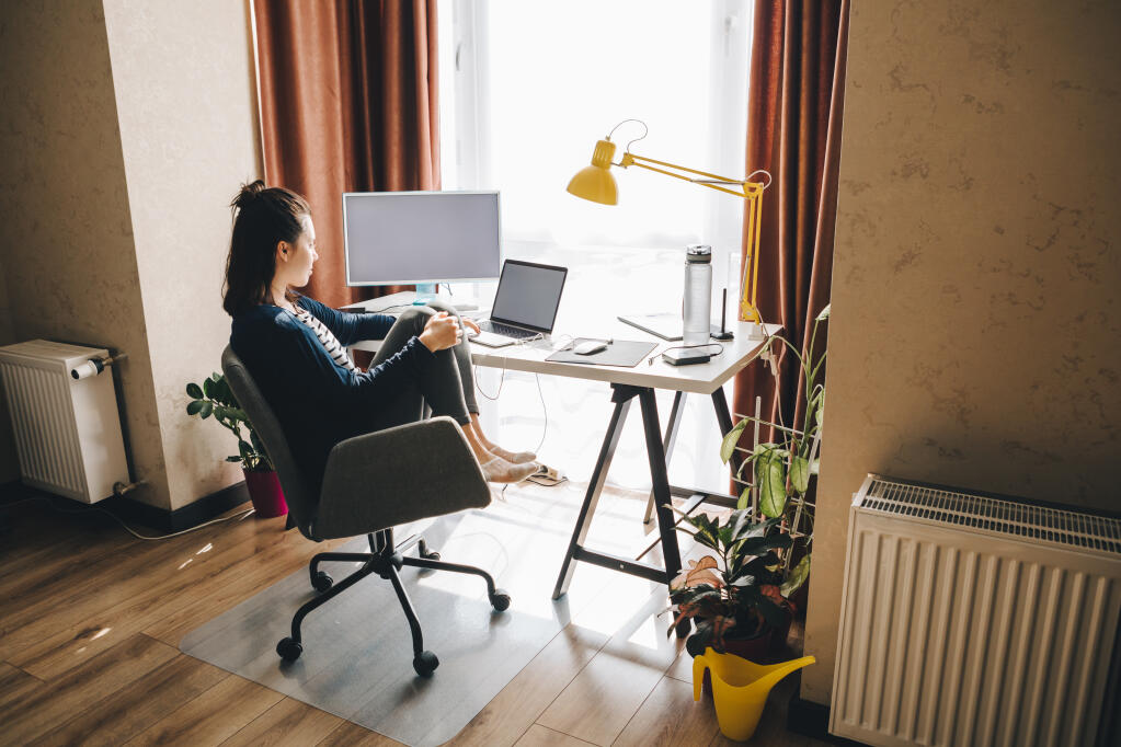 A YouGov poll from early this year found that 57% of remote workers say they are more likely to multitask during virtual meetings than they were before the pandemic. (Vera Petrunina / Shutterstock)