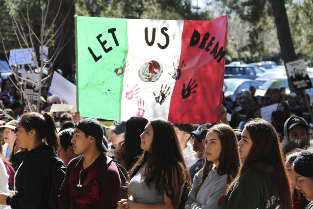 Students staged a walkout to protest the Trump Administration’s immigration policies, leaving textbooks behind to march from the Santa Rosa Junior College campus to downtown Santa Rosa after the final renewal period for the defunct Deferred Action for Childhood Arrivals (DACA) program ended March 5, 2018. ( Courtesy SRJC)