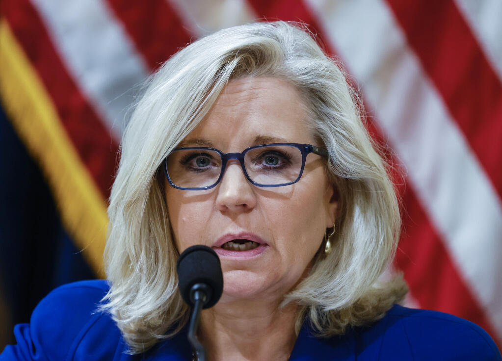 FILE - In this July 27, 2021 file photo, Rep. Liz Cheney, R-Wy., listens to testimony from Washington Metropolitan Police Department Officer Daniel Hodges during the House select committee hearing on the Jan. 6 attack on Capitol Hill in Washington.  House Democrats have promoted Republican Rep. Liz Cheney to vice chairwoman of a committee investigating the Jan. 6 Capitol insurrection. They're placing Cheney in a leadership spot on the panel as some members of the GOP caucus are threatening to oust her for participating. Cheney is a fierce critic of former President Donald Trump and has remained defiant amid the criticism from her own party.  (Jim Bourg/Pool via AP)