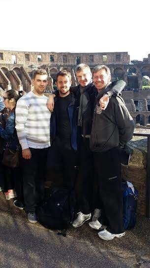 Dudley Logan, right, with his three sons, from left, Sheldon, Trenton and Peyton, during a visit to the Colosseum in Rome in 2014, when Sheldon was studying abroad through UC Berkeley.