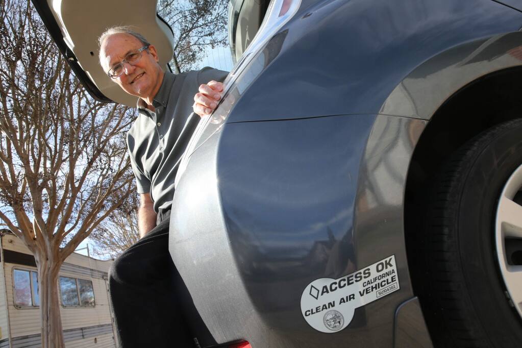 Clarence Dold, the owner of a Nissan Leaf, will no longer be able to use his clean air vehicle decal for the carpool lane. Photo taken on Wednesday, December 26, 2018 in Santa Rosa, California . (BETH SCHLANKER/The Press Democrat)