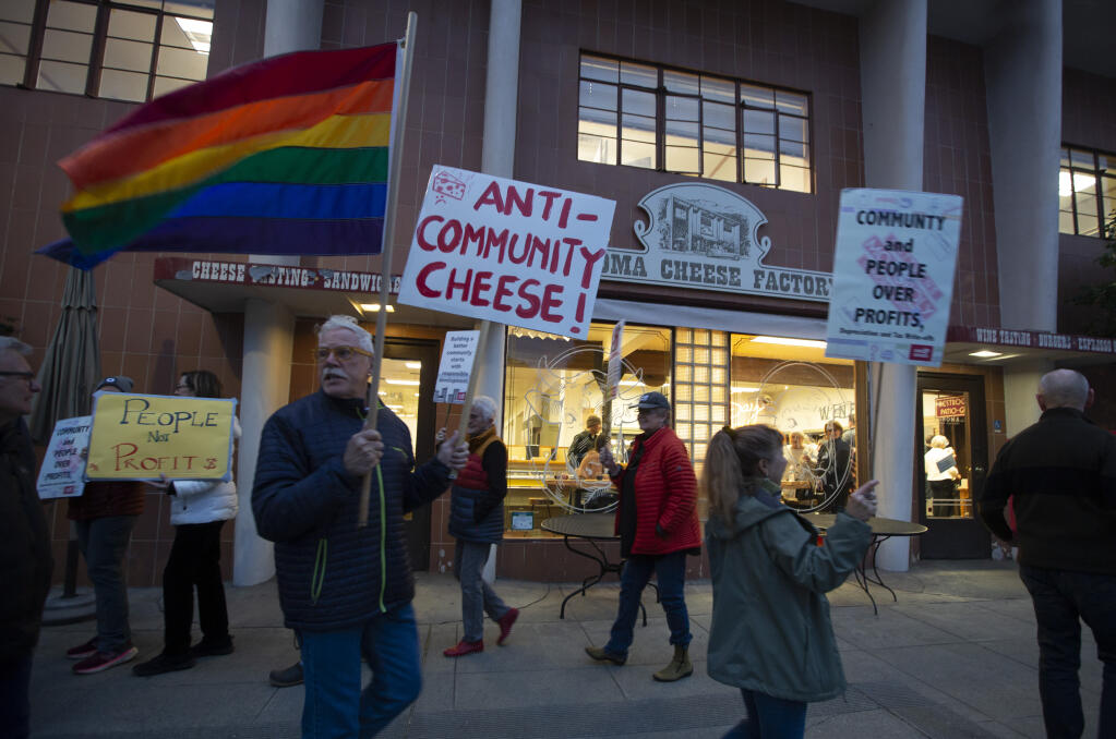 Members of Wake Up Sonoma, a citizens’ group that takes issue with Ken Mattson’s real estate purchases, gather outside the Sonoma Cheese Factory on Tuesday, Jan. 30, 2024. (Robbi Pengelly/Index-Tribune)