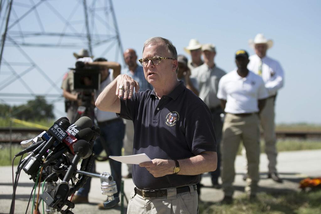 FILE - In this Aug. 1, 2016, file photo, National Transportation Safety Board (NTSB) member Robert Sumwalt speaks during a news conference at the scene of the worst hot air balloon crash in U.S. history that killed 16 people in July 2016 near Lockhart, Texas. The crash could result in federal investigators to call for hot air balloon pilots to obtain medical certificates. (Deborah Cannon/Austin American-Statesman via AP File)