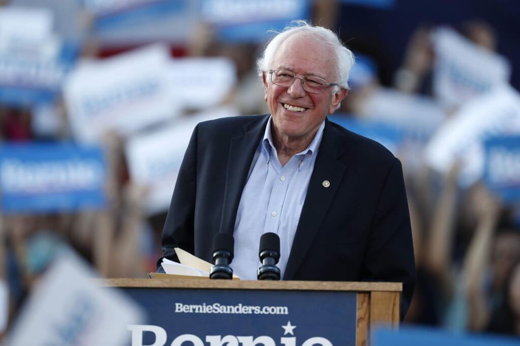 FILE - In this Monday, Sept. 9, 2019 file photo, Democratic presidential candidate Sen. Bernie Sanders, I-Vt., speaks during a rally at a campaign stop, in Denver. Sanders had a heart attack, his campaign confirmed Friday, Oct. 4, 2019, as the Vermont senator was released from a Nevada hospital. Sanders' campaign released a statement from the 78-year-old's Las Vegas doctors that said the senator was stable when he arrived Tuesday at Desert Springs Hospital Medical Center. (AP Photo/David Zalubowski, File)