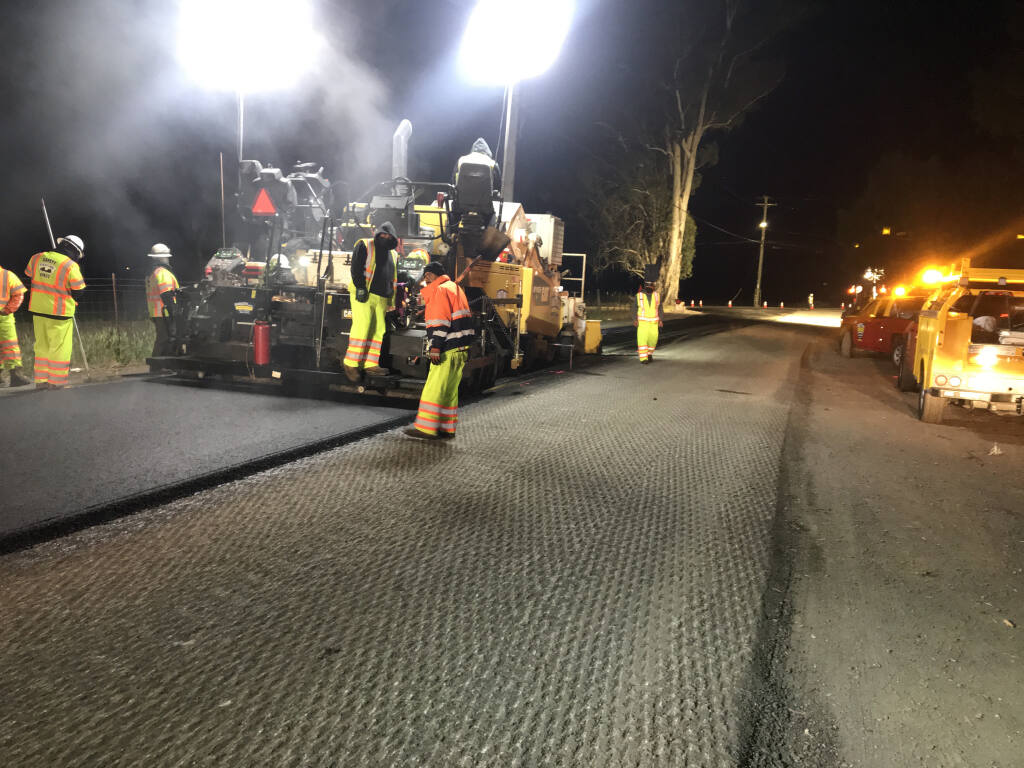 A Ghilotti Bros. paving crew resurfaces Stage Gulch Road in 2021. (courtesy of California Department of Transportation)