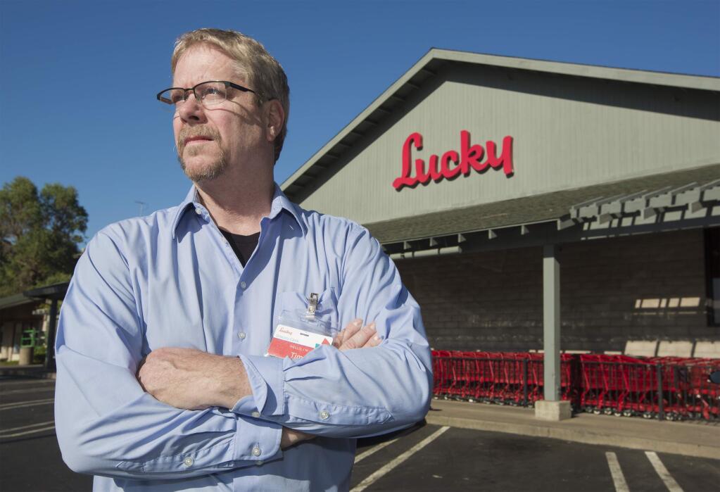Lucky Supermarkets cashier Tim Stansfield-Church will retire on Saturday, Aug. 17, after 30 years of service. (Photo by Robbi Pengelly/Index-Tribune)