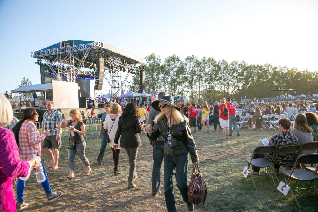 Love, festival goers 'found a way' Saturday while Pablo Cruise rocked the Field of Dreams. (Julie Vader/Special to the Index-Tribune)