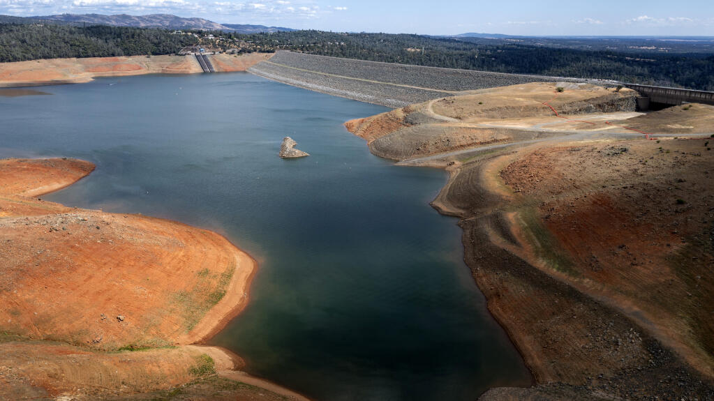 Dry hillsides surround Lake Oroville on Saturday, May 22, 2021, in Oroville, Calif. At the time of this photo, the reservoir was at 39 percent of capacity and 46 percent of its historical average.(AP Photo/Noah Berger)