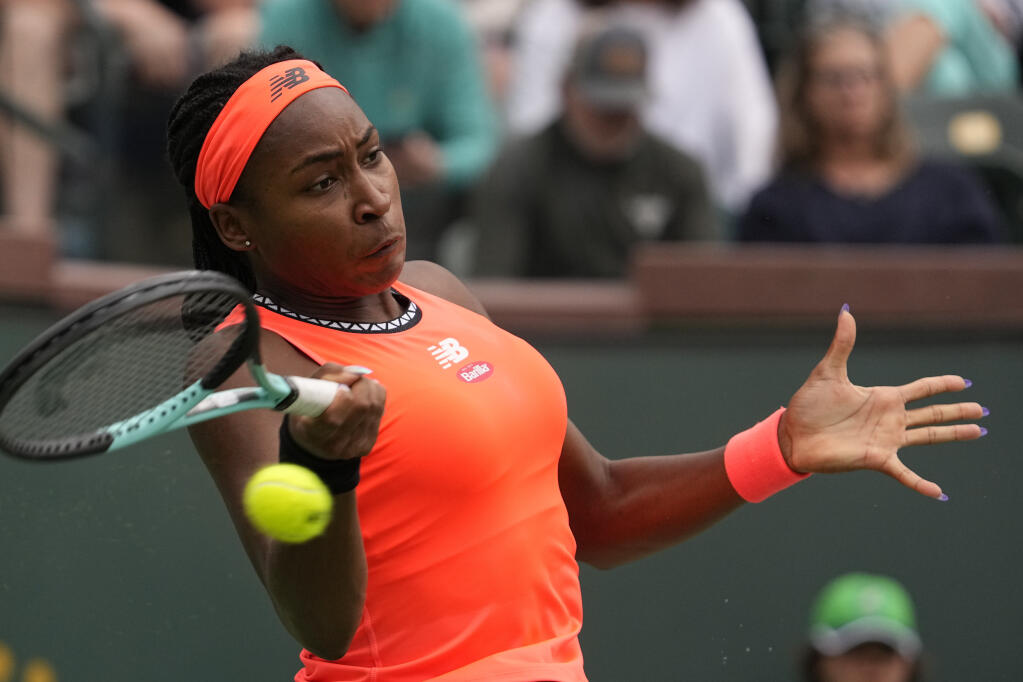Coco Gauff returns to Rebecca Peterson, of Sweden, at the BNP Paribas Open tennis tournament Tuesday, March 14, 2023, in Indian Wells. (Mark J. Terrill / ASSOCIATED PRESS)