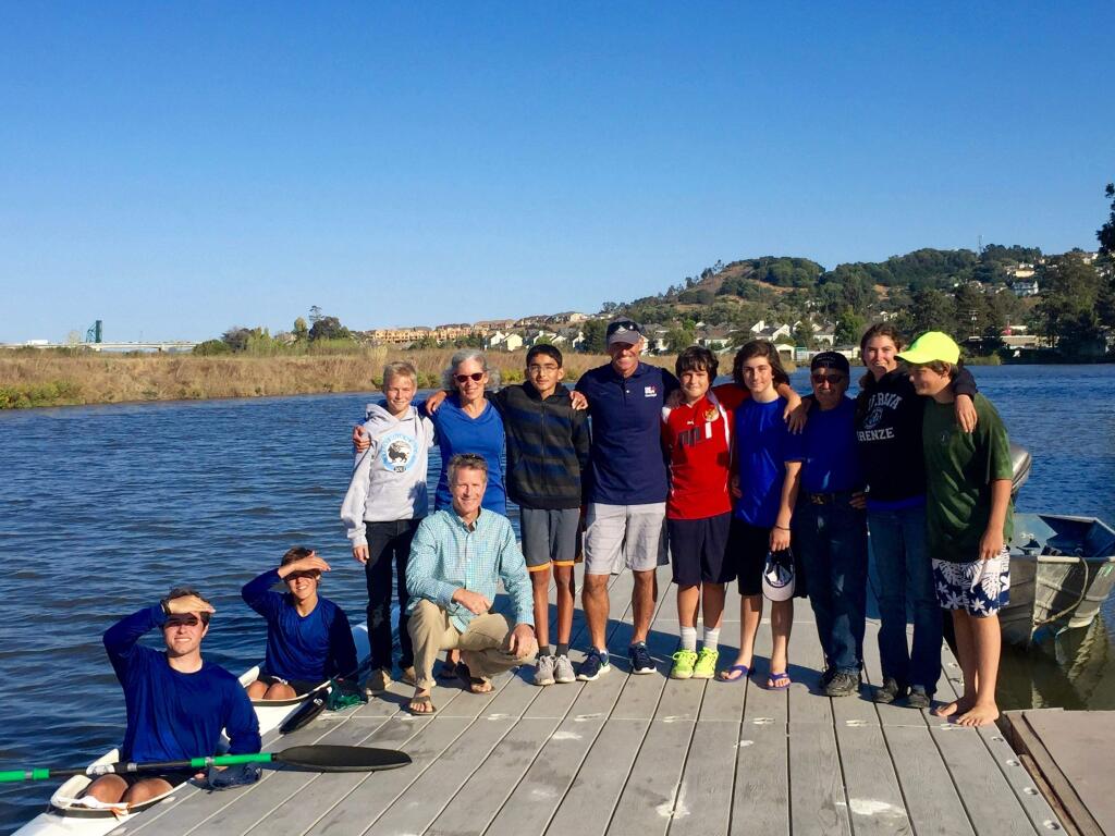 Olympian Chris Barlow, center in hat, encourages Petaluma's River Town Racers. Photo by Cath Caddell