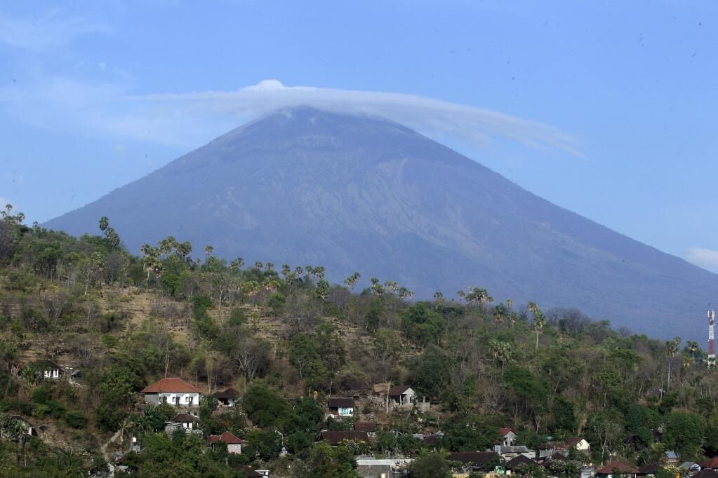 Mount Agung volcano is seen in Amed, Bali, Indonesia, Tuesday, Sept. 26, 2017. (AP Photo/Firdia Lisnawati)
