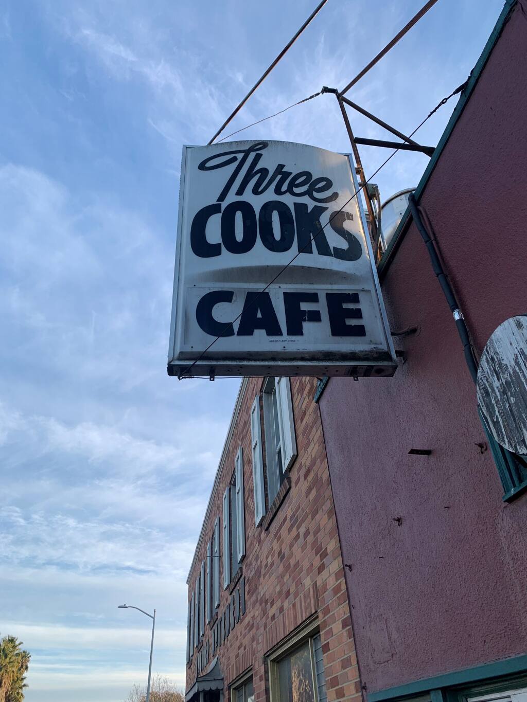 Another restaurant now operates where the Three Cooks Cafe once offered old-fashioned burgers and steaks, but the sign remains for all to see and remember. (DAVID TEMPLETON/ARGUS-COURIER STAFF)