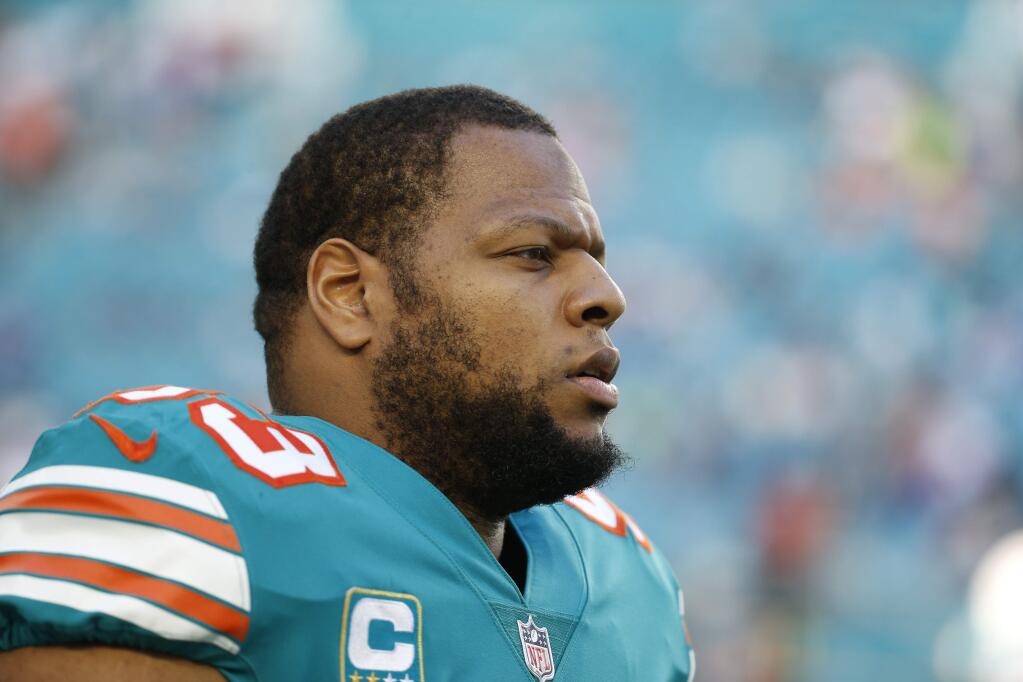 Miami Dolphins defensive tackle Ndamukong Suh is seen during the first half against the Buffalo Bills, Sunday, Dec. 31, 2017, in Miami Gardens, Fla. (AP Photo/Wilfredo Lee)