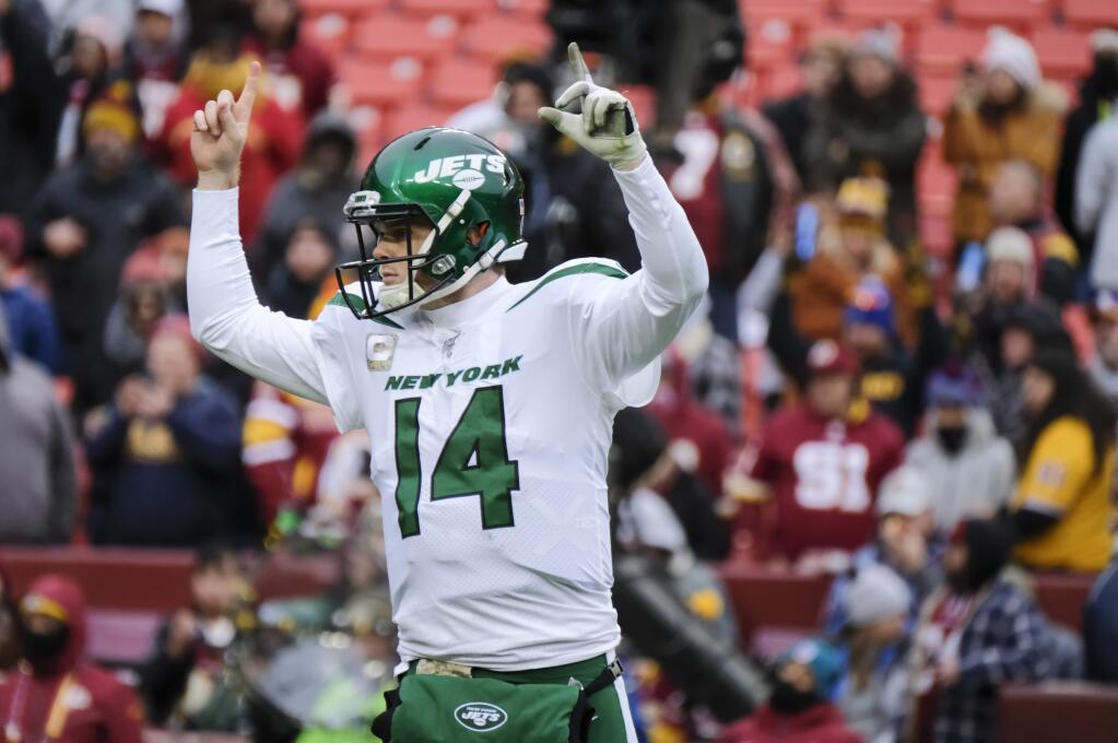 New York Jets quarterback Sam Darnold celebrates a touchdown against the Washington Redskins during the second half, Sunday, Nov. 17, 2019, in Landover, Md. (AP Photo/Mark Tenally)