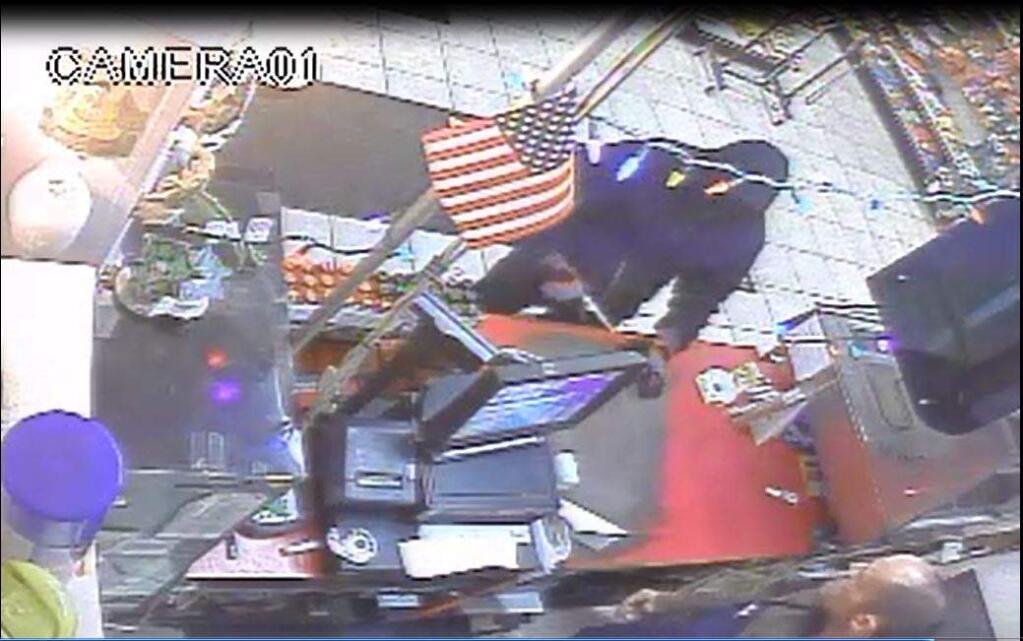 Surveillance images from Store 24 in Middletown showing what authorities described as an armed robbery on Monday night, Nov. 28, 2016 (Courtesy of Lake County Sheriff's Office)