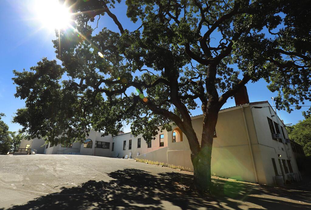 Sonoma County is in the final stages of selling an 82 acre site off Chanate Rd. in Santa Rosa which includes the old hospital complex and the mental health center, shown here. (John Burgess/The Press Democrat)
