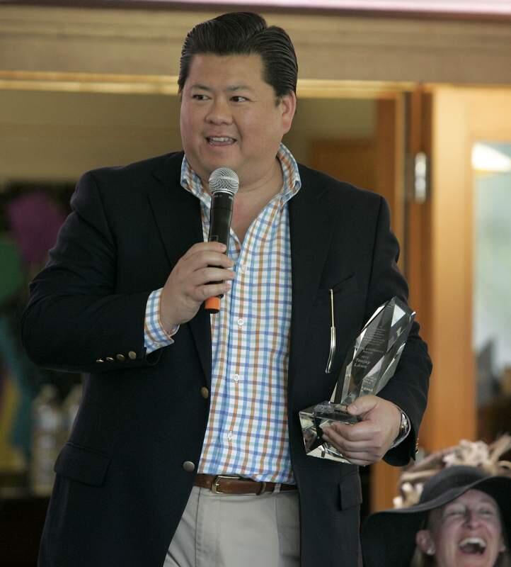 Teejay Lowe of G&G market receives the Making a Difference Award at the 14th Annual Meals on Wheels Derby Day benefitting Council on Aging's Meals on Wheels program on Saturday, May 4th at Sonoma-Cutrer Vineyards in Windsor. (Scott Manchester/The Press Democrat)