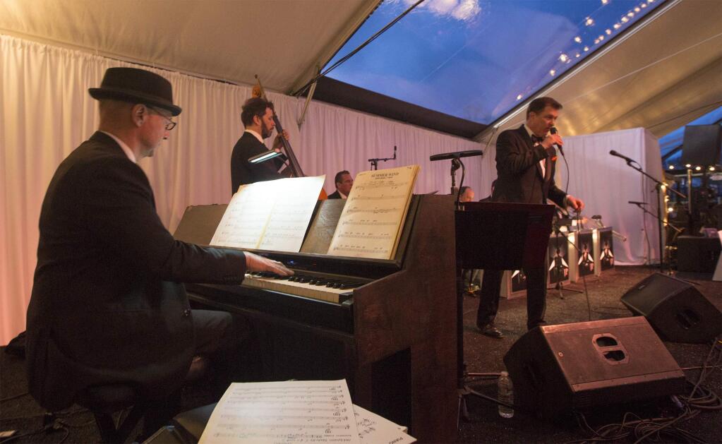 The Jonathan Poretz Orchestra entertained partygoers at SIFF's Frank & Ava Party on Friday night with romantic songs from the 1960s 'Rat Pack' era. (Photo by Robbi Pengelly/Index-Tribune)