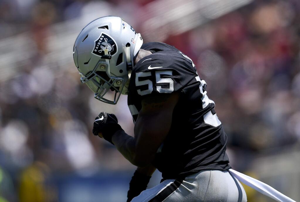 Oakland Raiders linebacker Marquel Lee celebrates after the Los Angeles Rams missed a field goal during the first half in a preseason game Saturday, Aug. 18, 2018, in Los Angeles. (AP Photo/Kelvin Kuo)