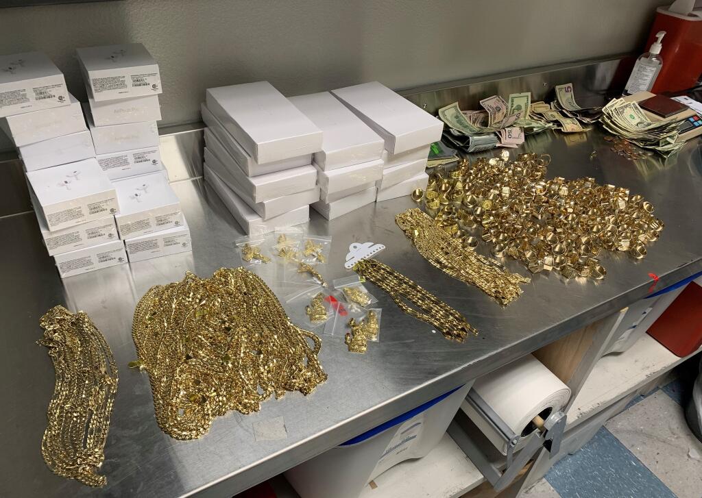 This image shows counterfeit jewelry and Apple products confiscated by Healdsburg police Tuesday, Sept. 19, 2023. (Healdsburg Police Department)