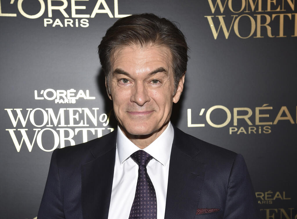 FILE - Dr. Mehmet Oz appears at the 14th annual L'Oreal Paris Women of Worth Gala in New York on Dec. 4, 2019. Oz, the cardiac surgeon and U.S. Senate candidate, will end his “Dr. Oz” syndicated talk show next month, and producers will replace it with a cooking show featuring his daughter.  (Photo by Evan Agostini/Invision/AP, File)