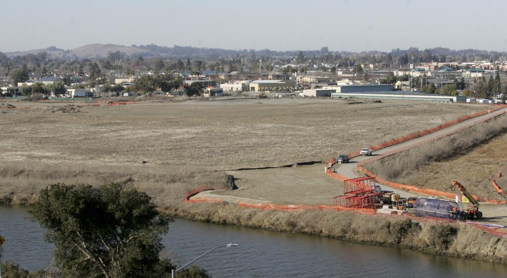 The land for the Hopper Street Development from across the Petaluma River with HWY 101 on the right.