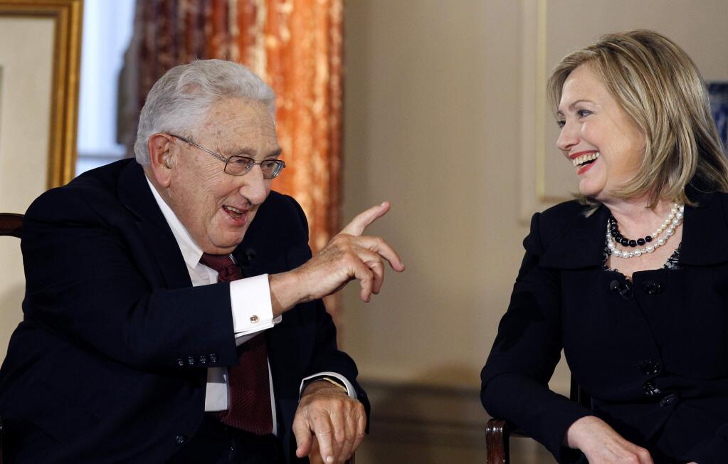 Former Secretary of State Henry Kissinger and Secretary of State Hillary Rodham Clinton talk during an interview by PBS' Charlie Rose, Wednesday, April 20, 2011, at the State Department in Washington. (AP Photo/Alex Brandon)