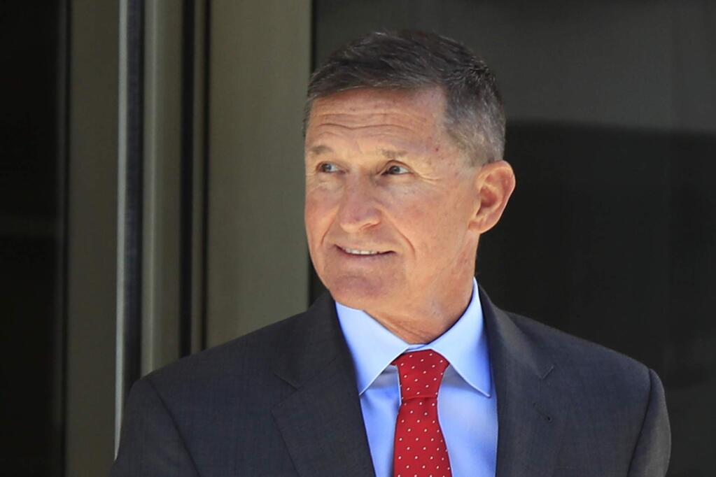 FILE - In this July 10, 2018, file photo, former Trump national security adviser Michael Flynn leaves the federal courthouse in Washington, following a status hearing. (AP Photo/Manuel Balce Ceneta, File)