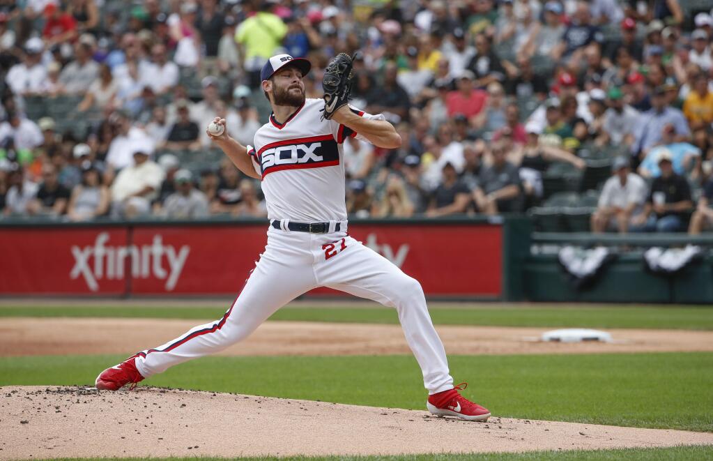 Chicago White Sox starting pitcher Lucas Giolito delivers against the Oakland Athletics during the first inning of a baseball game, Sunday, Aug. 11, 2019, in Chicago. (AP Photo/Kamil Krzaczynski)
