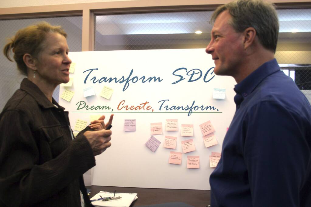 Christian Kallen/Index-TribuneJeanne Wirka of Audubon Canyon Ranch discusses the Sonoma Developmental Center with the Sonoma Land Trust's John McCaull, at the SDC Community Workshops, May 2, at Vintage House senior center.