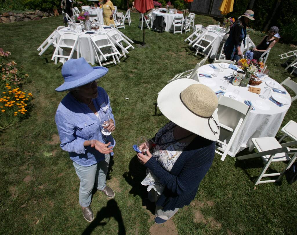 Nancy Hair and Jillian Standish talk at a fundraiser for Sister District, an organization created to flip Red states to Blue. The event is held at Casa Flores on Sunday, June 16, 2019 in Sebastopol, Ca. (Frankie Frost/Special to The Press Democrat)