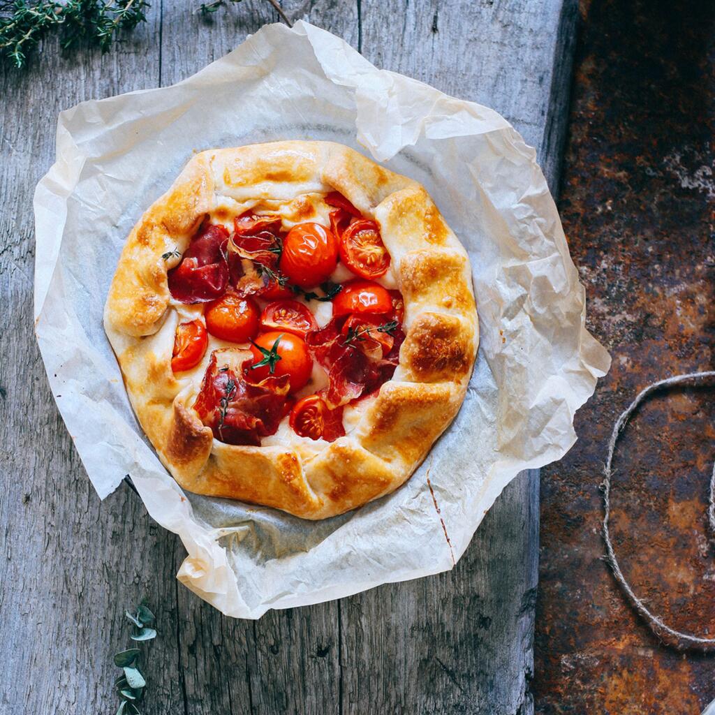 A tomato gallette. When filling a gallette, remember that less is more - you want to avoid overfilling, which can make the dough soggy.
