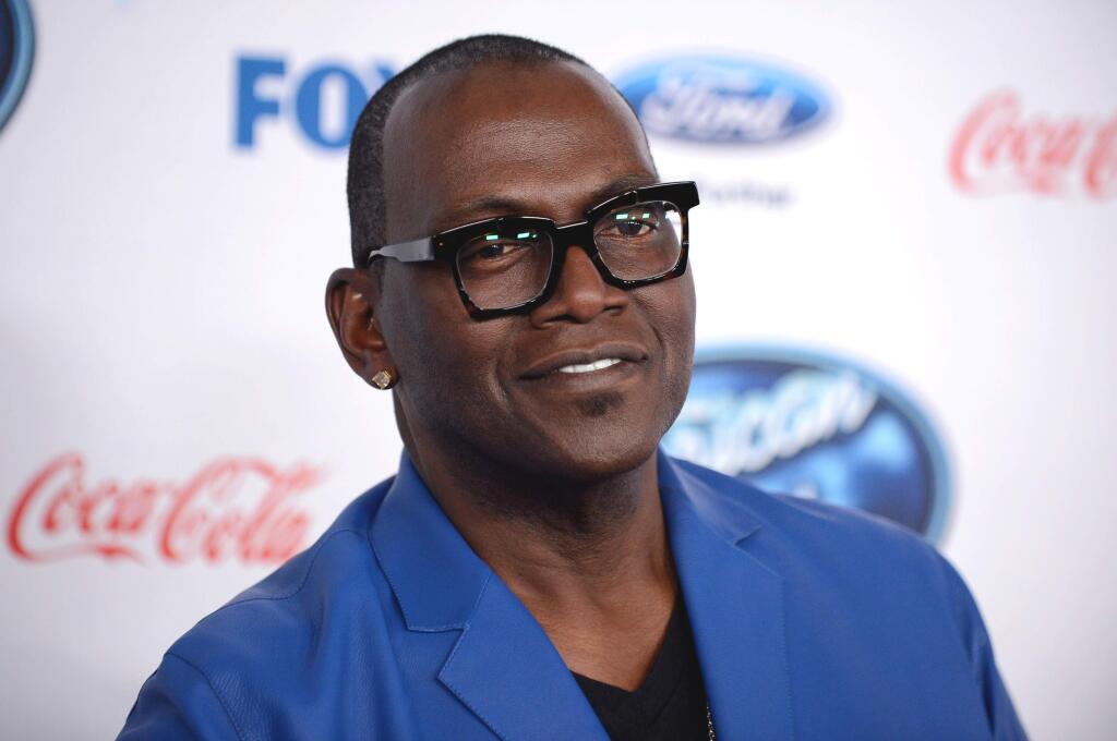 FILE - In this Feb. 20, 2014 file photo, Randy Jackson attends FOX's 'American Idol XIII' finalists party at Fig & Olive Melrose Place in West Hollywood, Calif. Fox and the producers of 'American Idol' say Jackson is exiting the show after 13 seasons. In a statement Tuesday, Nov. 11, 2014, the network and producers called Jackson a key part of the singing contest, and said he'd be welcome back as a visitor. (Photo by Jordan Strauss/Invision/AP, File)