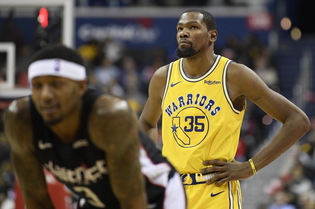 Golden State Warriors forward Kevin Durant stands on the court during the second half against the Washington Wizards, Thursday, Jan. 24, 2019, in Washington. The Warriors won 126-118. (AP Photo/Nick Wass)