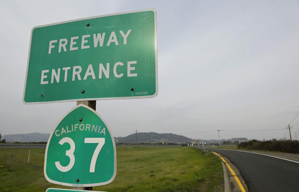 State Sen. Bill Dodd, D-Napa, announced legislation to convert Highway 37 to a toll road, with revenue earmarked for efforts to prevent sea level rise from submerging the roadway. (ERIC RISBERG / Associated Press)